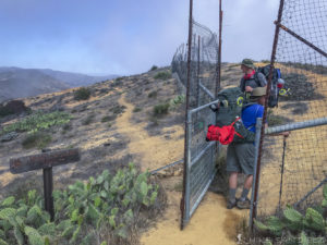 The gate you need to pass through to continue on the trail by Haypress Reservoir.